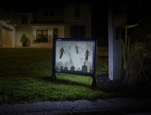 Ghosts In The Grave Yard Sign